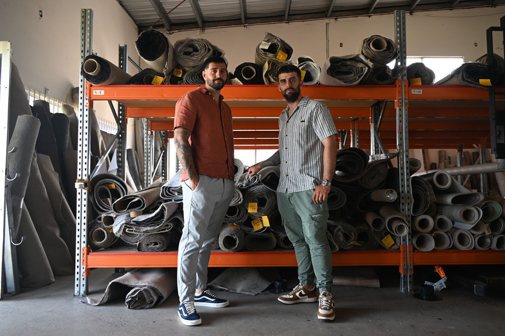 Siblings Daniel (left) and William Hortomaris are the new owners of 30-year-old business Carpet Bob at Portsmith. Picture: Isabella Guzman Gonzalez