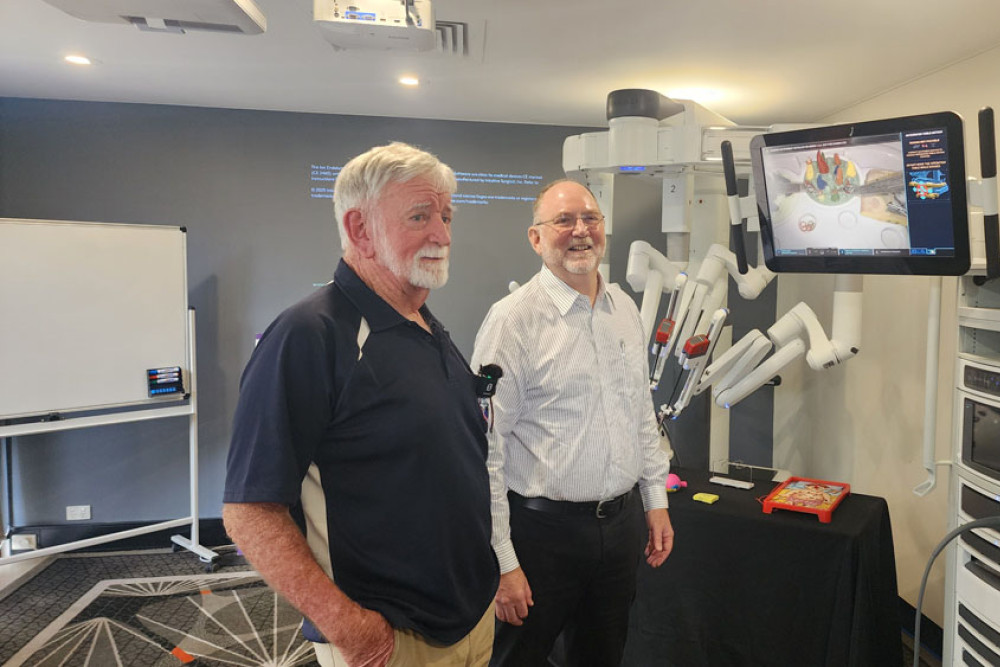 MUA Cairns branch representative Bernie Gallen (left) and foundation chairman Dr Ken Chapman discuss the benefits of a surgical robot. Picture: FNQ Hospital Foundation