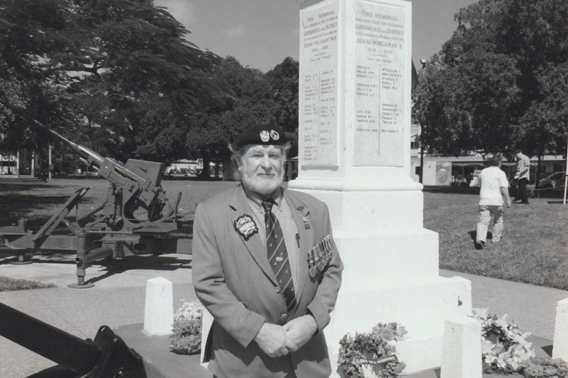 David ‘Chalky’ Chalk beside the Gordonvale Cenotaph when it was in top condition. Picture: Supplied