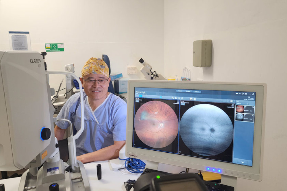 Queensland Children’s Hospital ophthalmology clinical director Professor Shuan Dai with a $166,000 OCT machine and wide field retinal camera donated by the foundation. Picture: Supplied