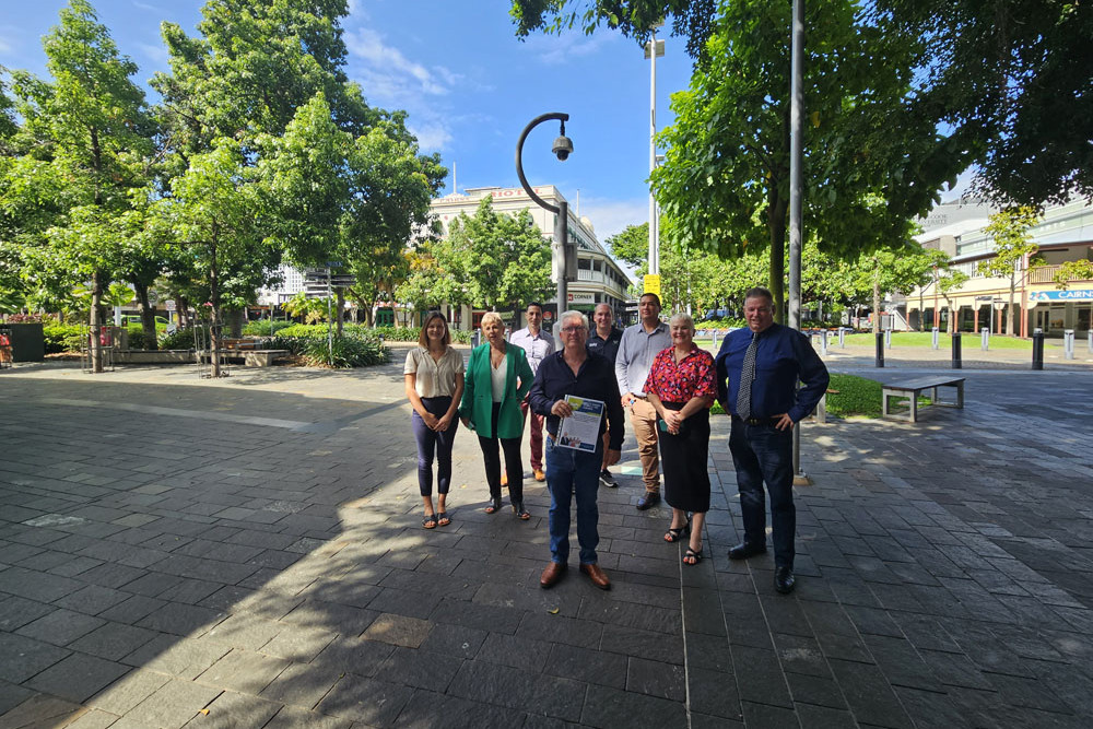 Unity team members in front of a CCTV camera in the Cairns CBD include (from left) Heidi Healy, Rhonda Coghlan, Matthew Calanna, Terry James, Jeremy Neal, Nathan Lee Long, Kristy Vallely and Brett Moller. Picture: Nick Dalton