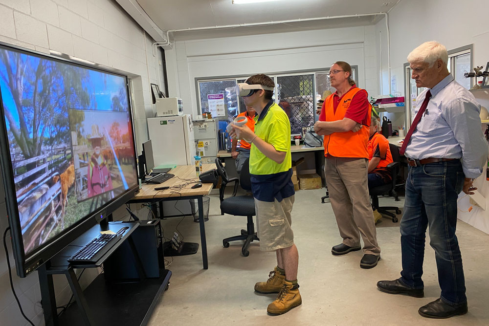 Endeavour Foundation employee Ben Exon, supervisor Chris Beaumont and Federal MP Bob Katter check out the new Virtual Reality equipment at the foundation’s Innisfail centre. Picture: Endeavour Foundation