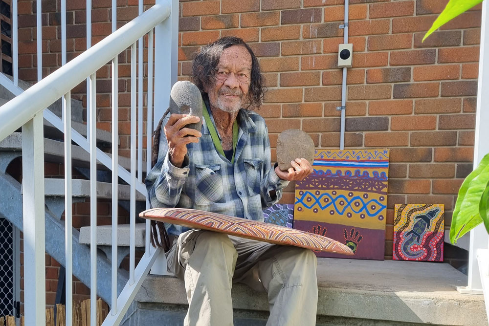 Yirrganydi elder Dr George Skeene with some of his treasured artefacts. Inset: Dr Skeene with his Order of Australia medal. Main picture: Nick Dalton