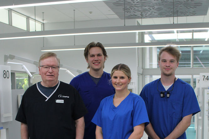 JCU Dental director Prof John Abbott (left) with fourth-year dentistry students Cameron Newcomb, Jordan Sutherland and Charlotte McKinley. Picture: Isabella Guzman Gonzalez