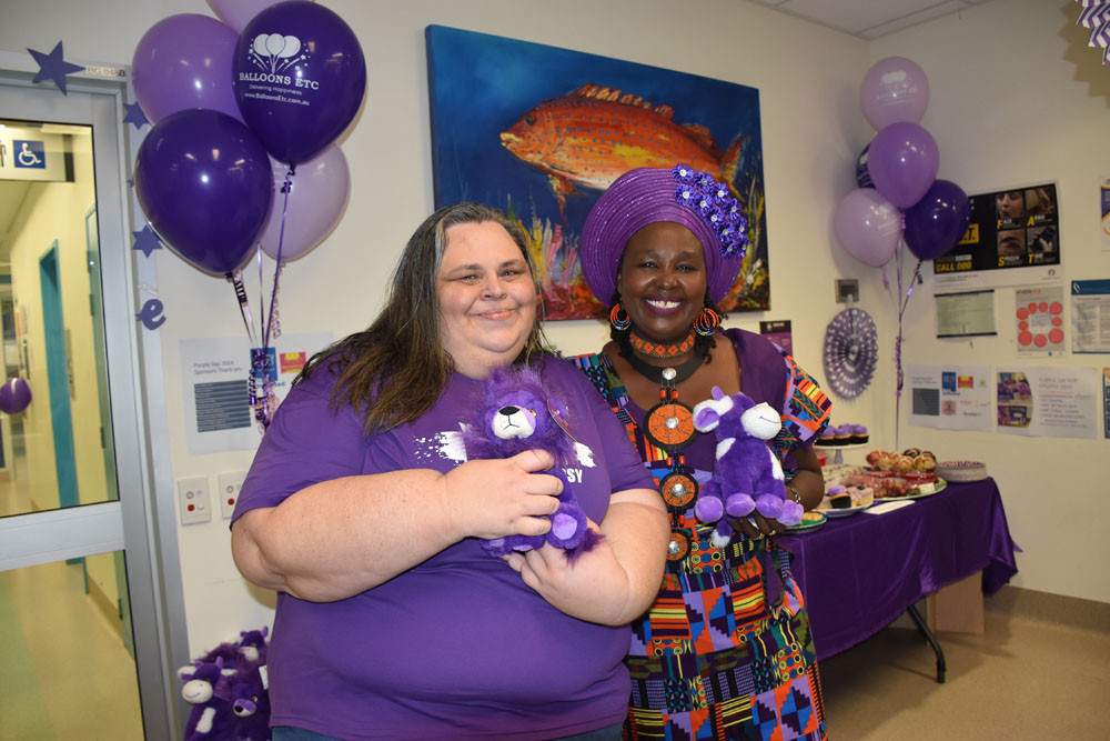 Epilepsy Queensland volunteer and epilepsy patient Alison Jackson and hospital administration officer Teresia Lallemand call on the community’s support. Picture: Isabella Guzman Gonzalez