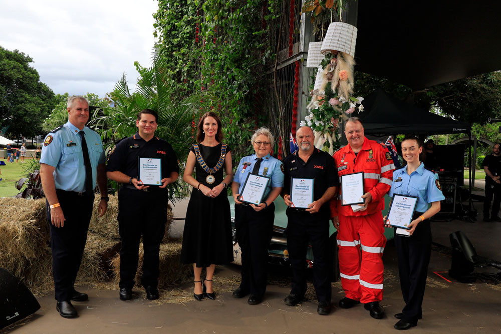 SES area controller Matt Currey (left), Mayor Amy Eden, Binjira Nolan-Mundraby, Sharon Pedersen, Gary Chapman, Craig Mann-Jones and Bethany Sarles with their awards for service. Picture: Supplied