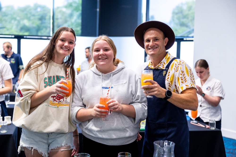 Cooktown State School students Bonnie Lane-Ritchie and Chloe Hanson with Lyre Spirit Co’s (nonalcohol) global brand ambassador Jeremy Shipley. Picture: Supplied