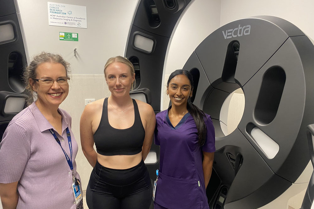 Cairns Hospital dermatologist Dr Ilsphi Browne, plastics wound nurse Bella Martin and enrolled nurse Alicia Sewcharran in front of the state-the-art body scanner at Cairns Hospital.