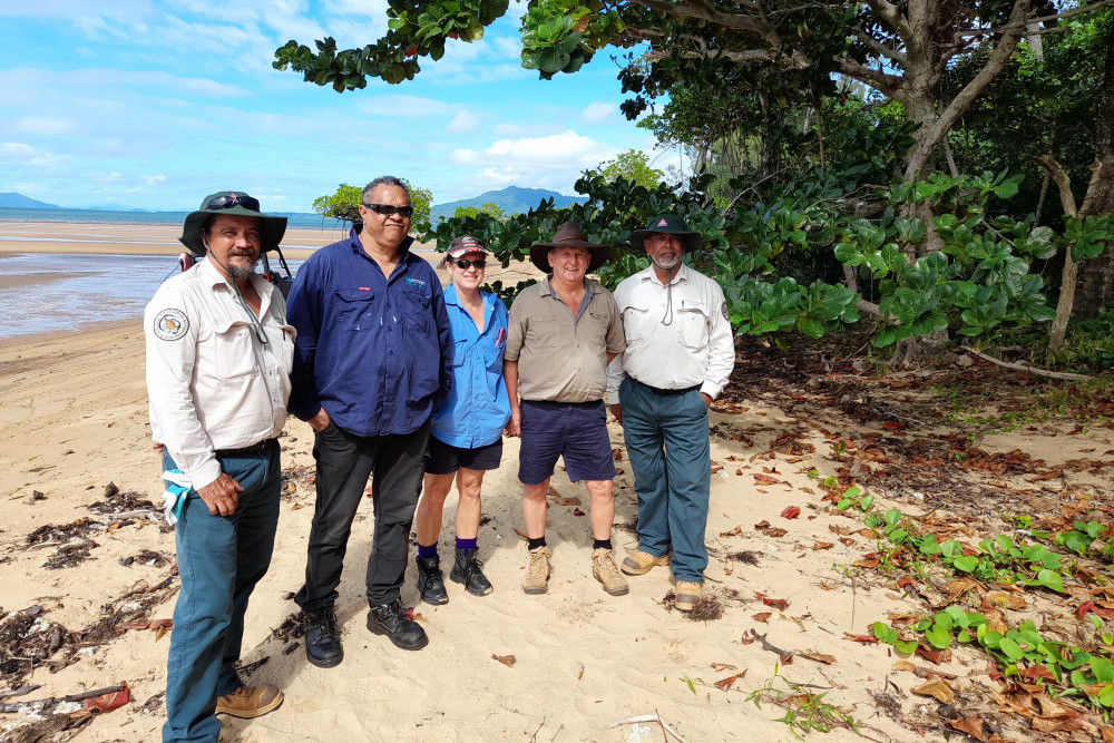 Mandubarra Rangers helping land managers at Kurrimine Beach (L-R) Mandubarra Senior Ranger James Epong, Terrain NRM Indigenous Partnerships Coordinator Michael Morta, Department of Resources’ Kim Parker and Russell Jack, and Mandubarra Ranger Sean Kyle.
