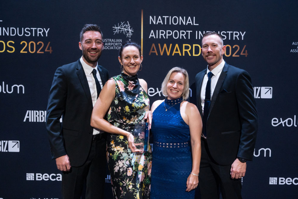 Celebrating the airport of the year award in Brisbane last week were (from left) were Cairns Airport team members James Dalziel (landside infrastructure manager), Alicia Prince (head of operations), Sheree Gall (safety and infrastructure manager) and Mark Henriksen (works delivery manager). Picture: Australian Airports Association