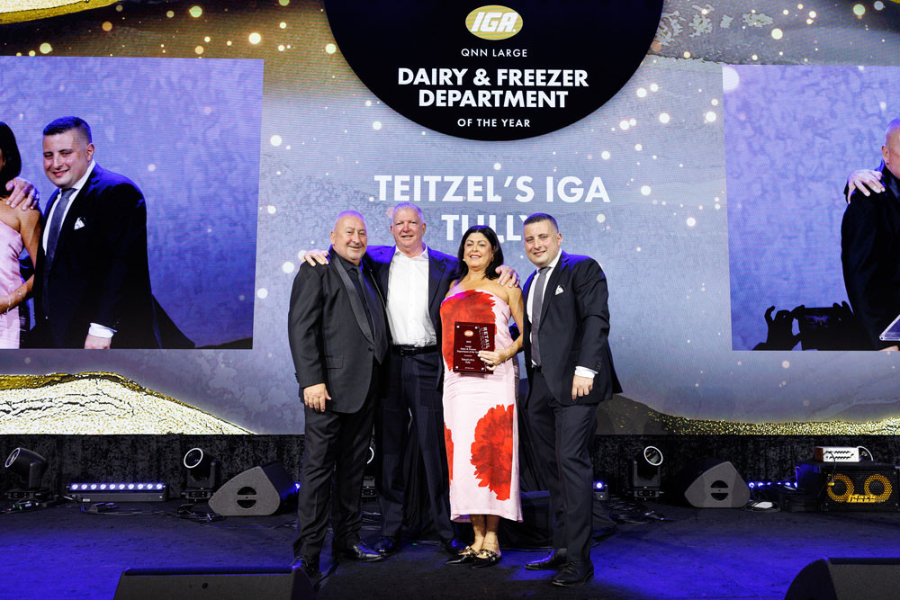 Metcash general manager Roy Leisk (left), Teitzel IGA owners Craig and Ellen-May Teitzel and IGA supermarkets chairman Frank Spano with the large dairy and freezer department award. Picture: Supplied