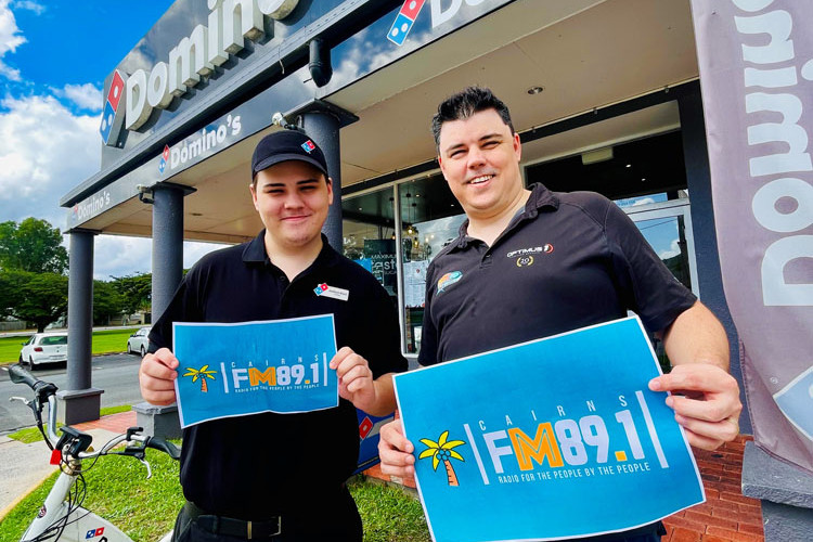 Domino’s Pizza Manunda manager Jackson Koch and Barry Koch of Cairns FM89.1 are urging people to buy a pizza and raise money to keep the radio station on air. Picture: Supplied