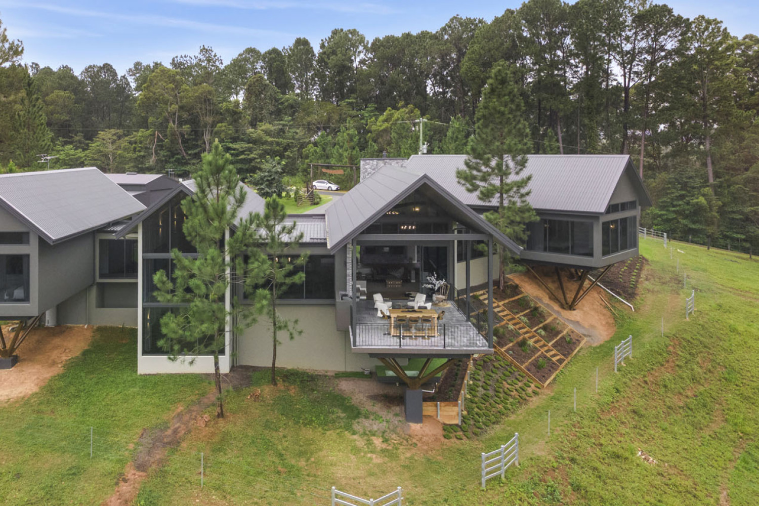 Pine Ridge Retreat, which features cantilevers over the ridge to maximise the views of Lake Barrine, won Ash Moseley Homes the HIA Cairns home of the year for 2025. Picture: Supplied