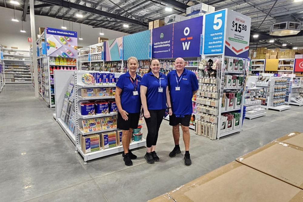 Its a family affair at Officeworks Cairns with Alana Elian (centre) as store business manager with co-workers mum Eve and dad Richard Kilpatrick. Picture: Nick Dalton