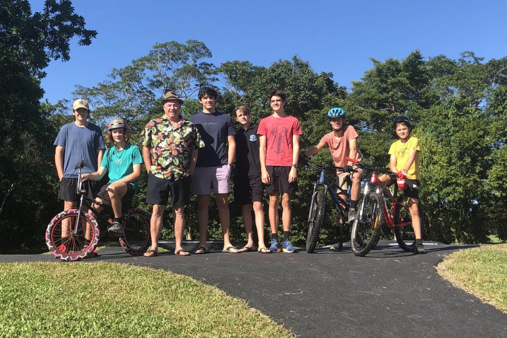 Cr Moller and attendees at the opening of the pump track.