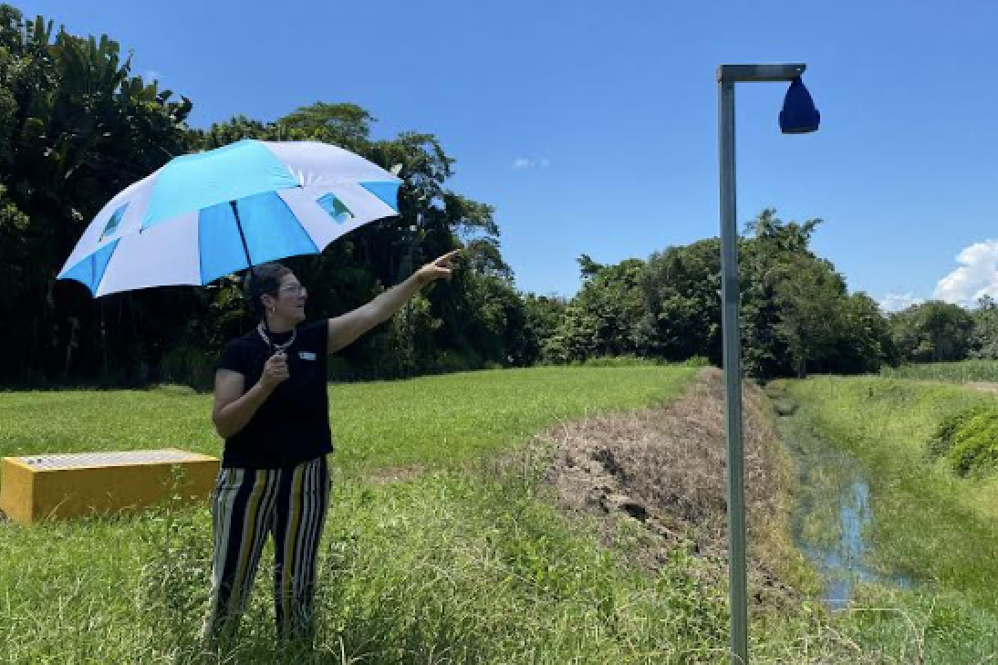 Mayor Teresa Millwood with Flood Sensor at Oak Street