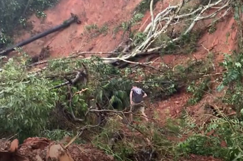 Cape Tribulation farmer Jeremy Blockey and the damage caused to his property after Cyclone Jasper last year. Pictures: Supplied