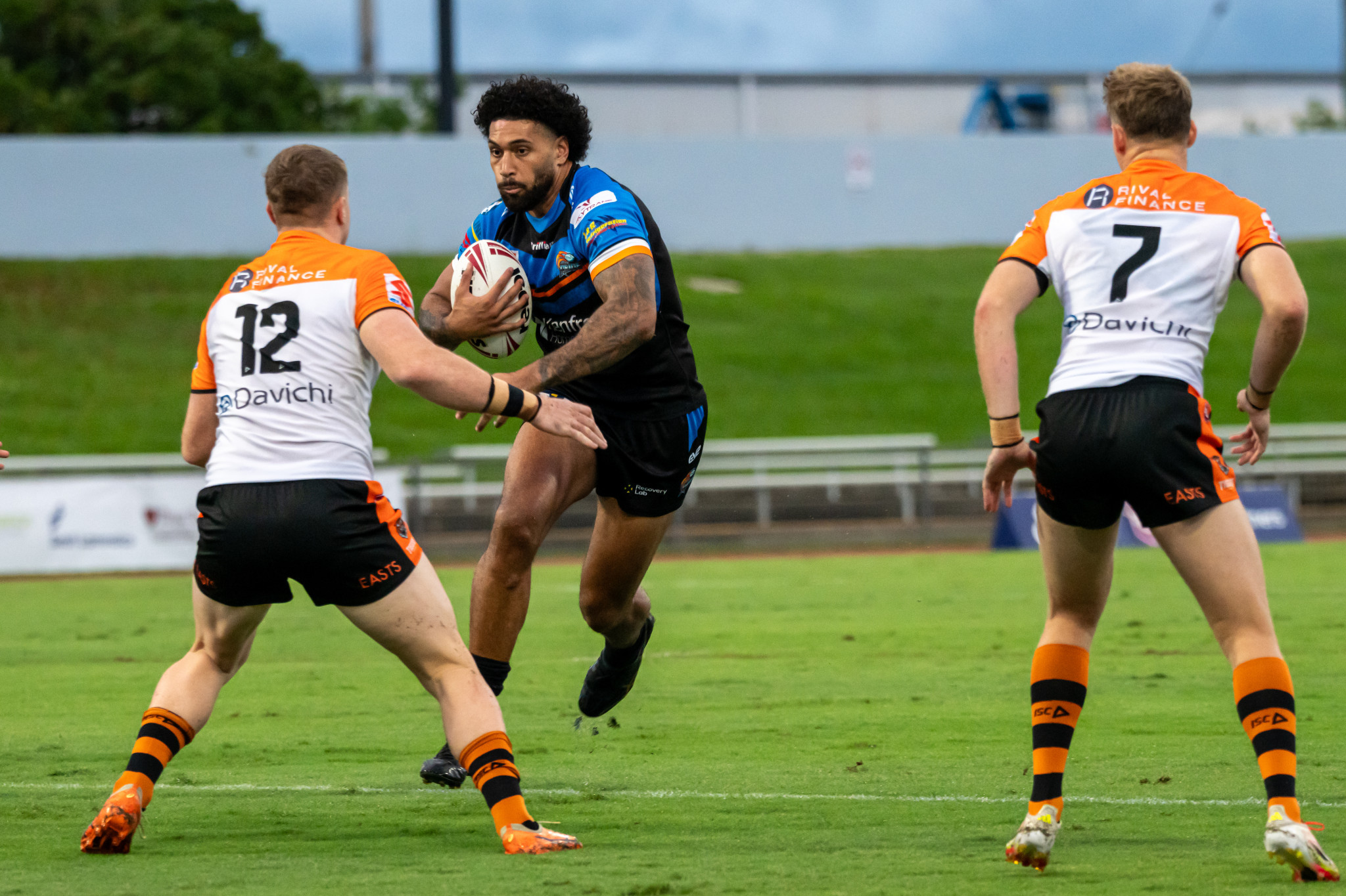Dane Aukafolau attempt to break the defence of the Brisbane Tigers. PICTURES: Emily Barker