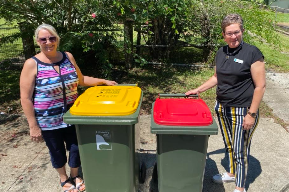 Cassowary Coast councillors Ellen Jessop (left) and Mayor Teresa Millwood with the recycling bins.