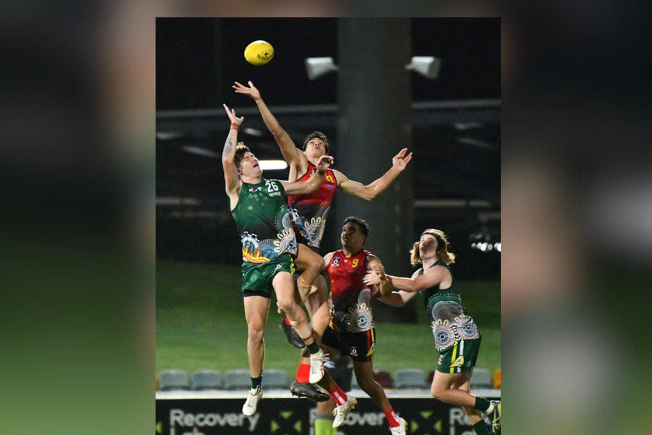 Caiden Gardiner gets the tap over Joel Callaghan. at last weekend’s All Stars round. Pictures: RAWI/AFL Cairns