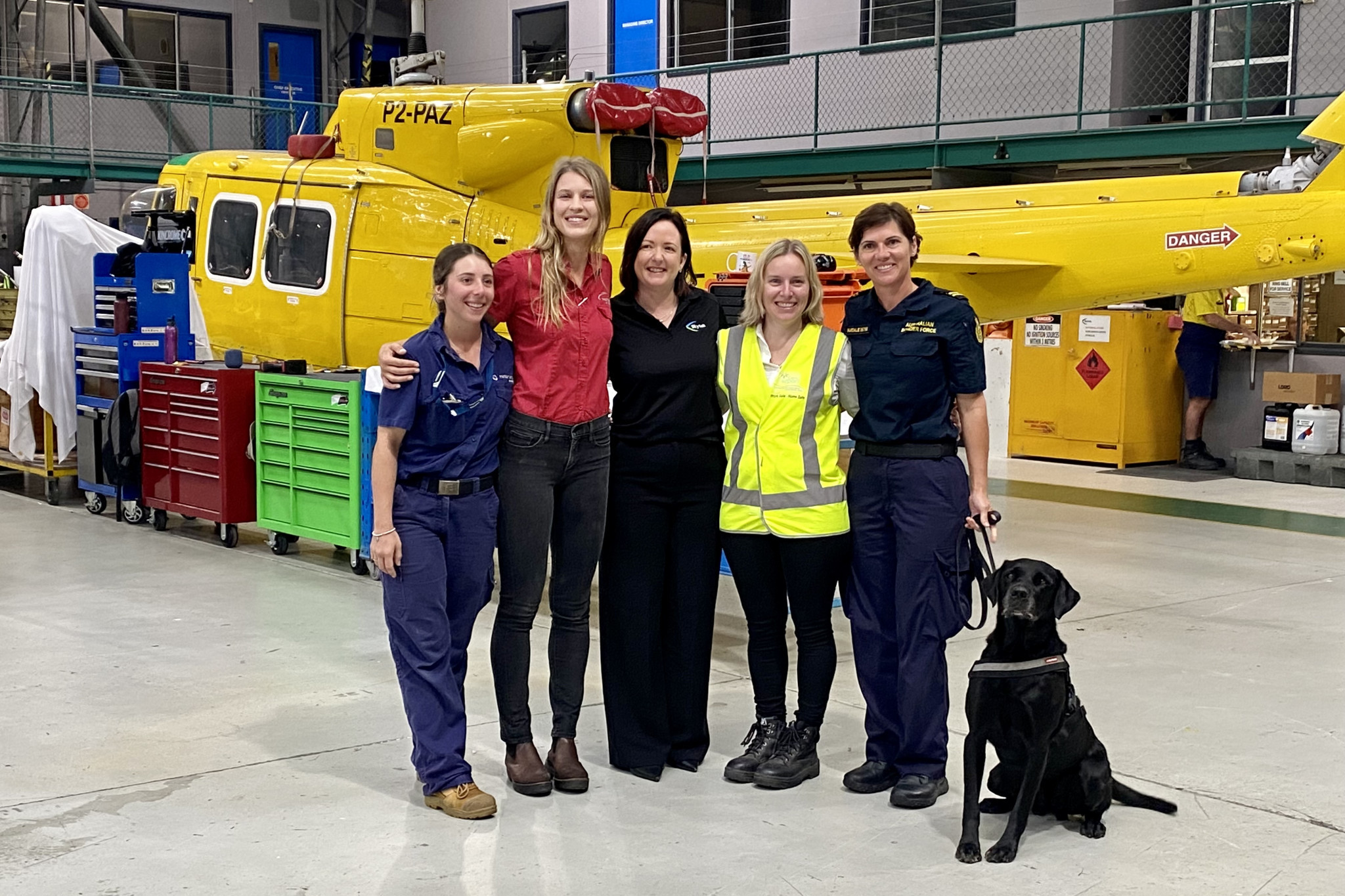 Hinterland Aviation aircraft maintenance engineer apprentice Keeley Mason (left) , Nautilus Aviation pilot Shauna Wild, Skytek chief executive Alana McKenna, Cairns Airport airside infrastructure manager Sheree Gall and Australian Border Force Far North Queensland detector dog unit team leader Natalie Cross. Pictured: SUPPLIED