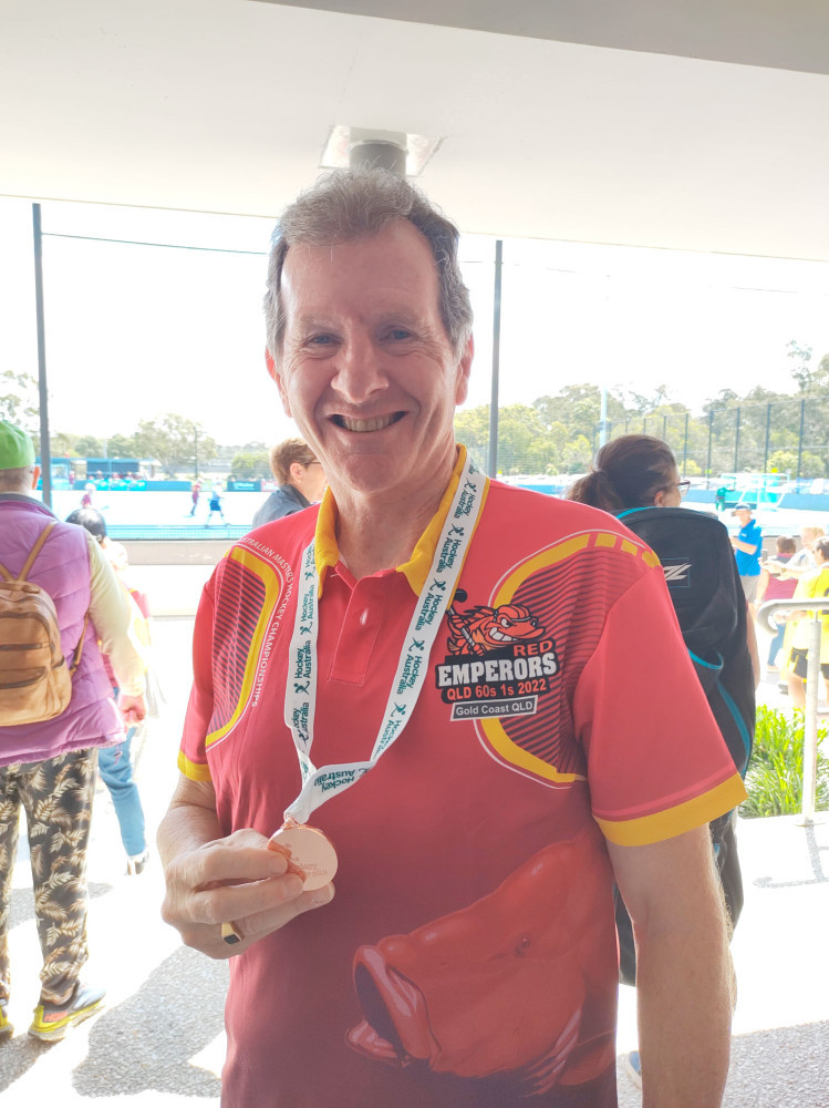 Greg Mill guides Queensland’s Masters Hockey Team to Bronze