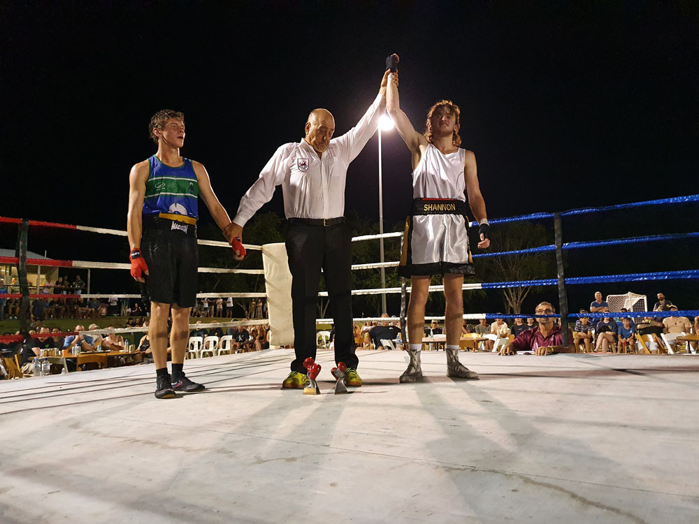 (R) Josh Shannon from Kingdom Boxing Club, Ingham, wins over (L) Jai Lewin from Zenadth Kes Boxing Club, Thursday Island.