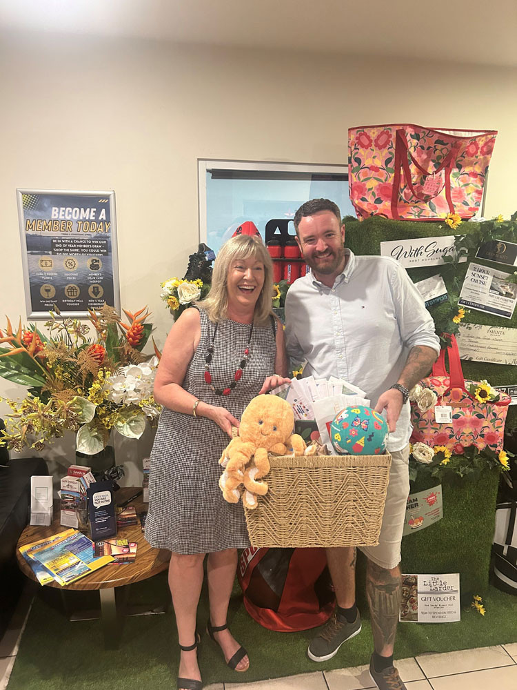 Tin Shed Christmas draw winner Heather English with Tin Shed general manager Kyle Livingston. Picture: Supplied