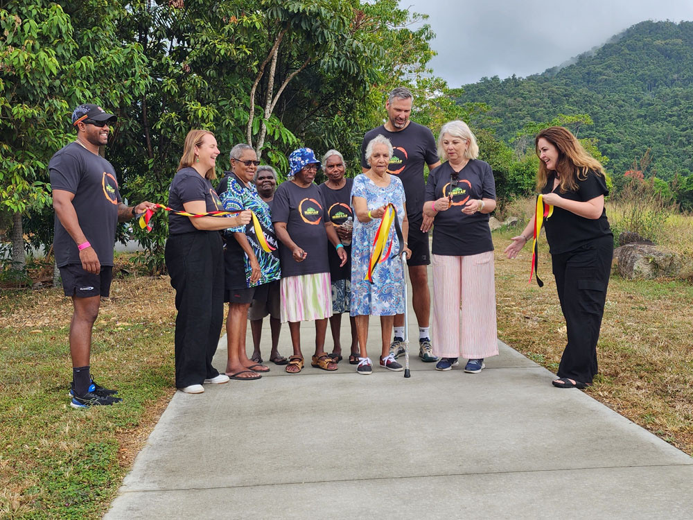 Elder Aunty Betty together with other local elders, plus Senator Nita Green and Douglas Shire Mayor Lisa Scomazzon officially open the new pathway at Mossman Gorge.