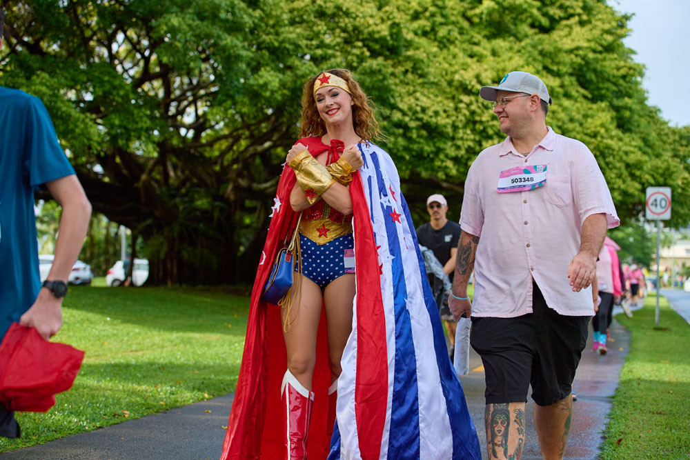 Victoria, dressed as Wonder Woman, did the 2km in stiletto boots with Lawrence (surnames withheld).