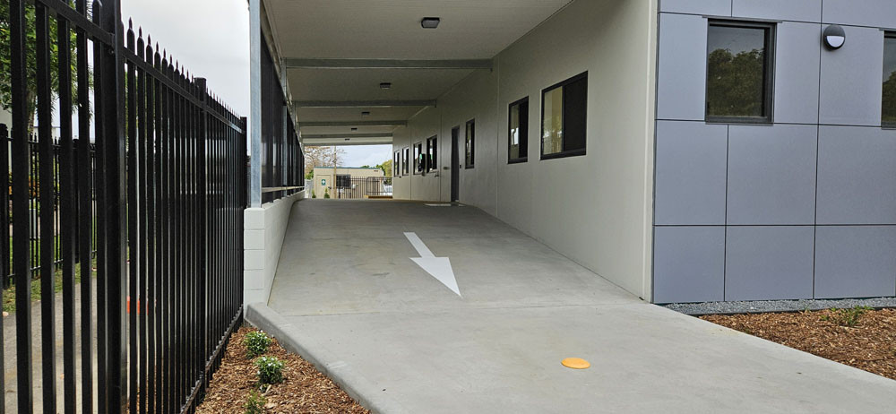 The new Cairns Meals on Wheels building has a special undercover drive-through area so volunteers can pick up meals shielded from the rain and sun. Picture: Nick Dalton