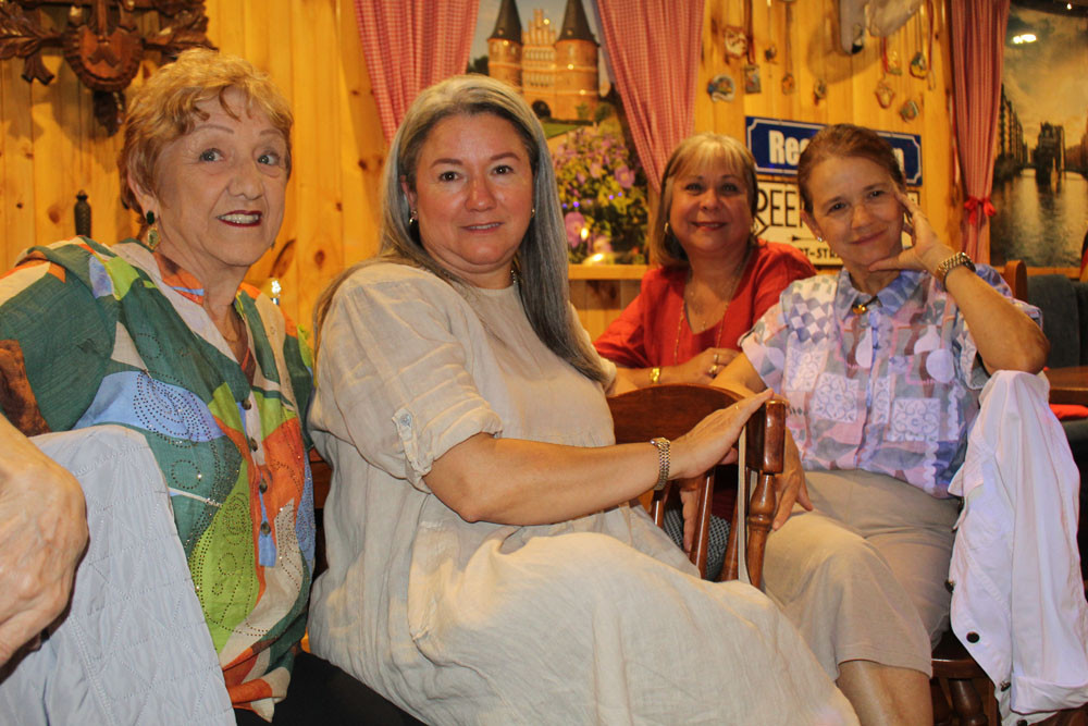 Marta Arocena (left), Marcela Naranjo, Audrey Cash and Luz Posada loved the food, music, dancing and raffles at the Colombian festival.