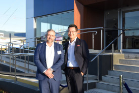 pg-22—(l-r)-volvo-national-chief-operating-officer—tony-pepper-and-cairns-cars-dealer-principal—alan-ren.-1670510889.jpg