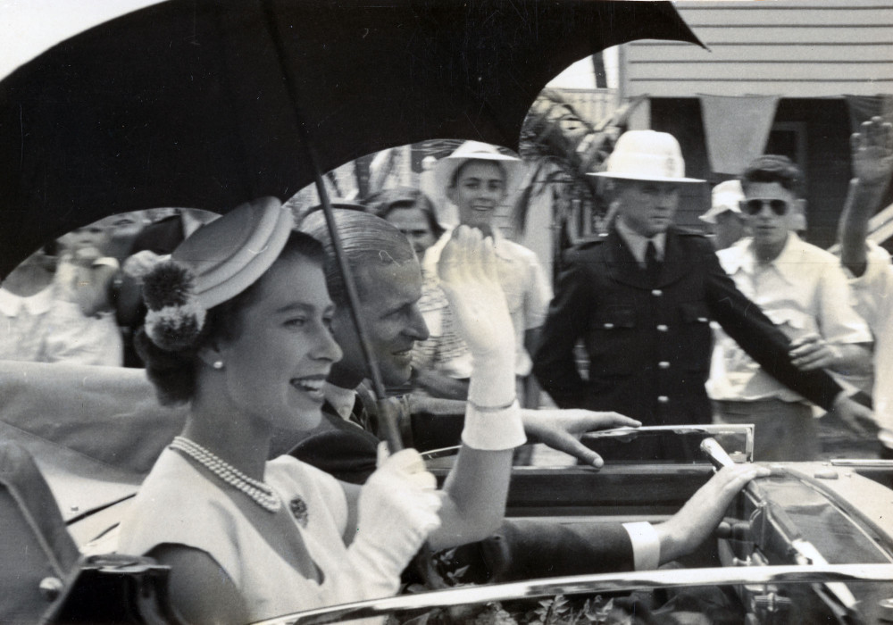 Her Majesty was dressed for the occasion in a pure silk shantung frock, which she teamed white medium length gloves, and white fine straw hat. Photograph courtesy CHS.