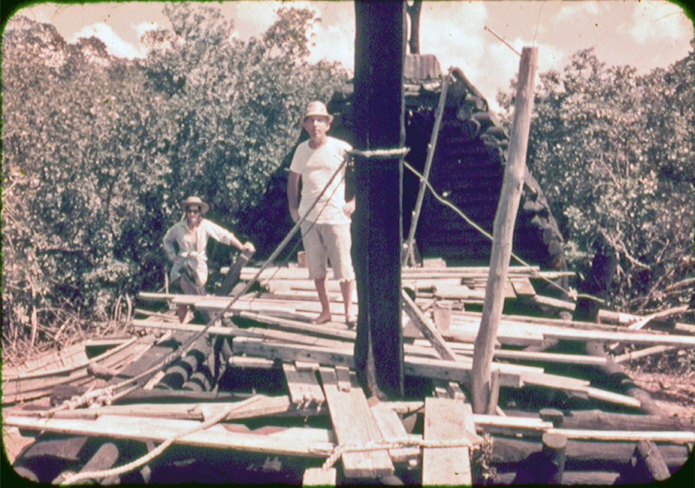 John C. Hay and friend aboard Mooney’s log boat, c. 1970, courtesy MSHS