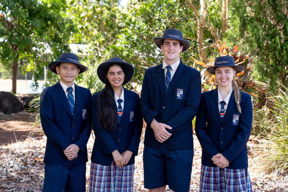 An aerial view of St Stephen’s College. Inset: School captains (from left) Michael Liu, Manvir Kaur, Rylan Srhoj and Ella Daven. Pictures: Supplied