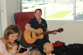 Jaye Oldes from Uplift Music leads the Christmas Singalong at Manunda Library