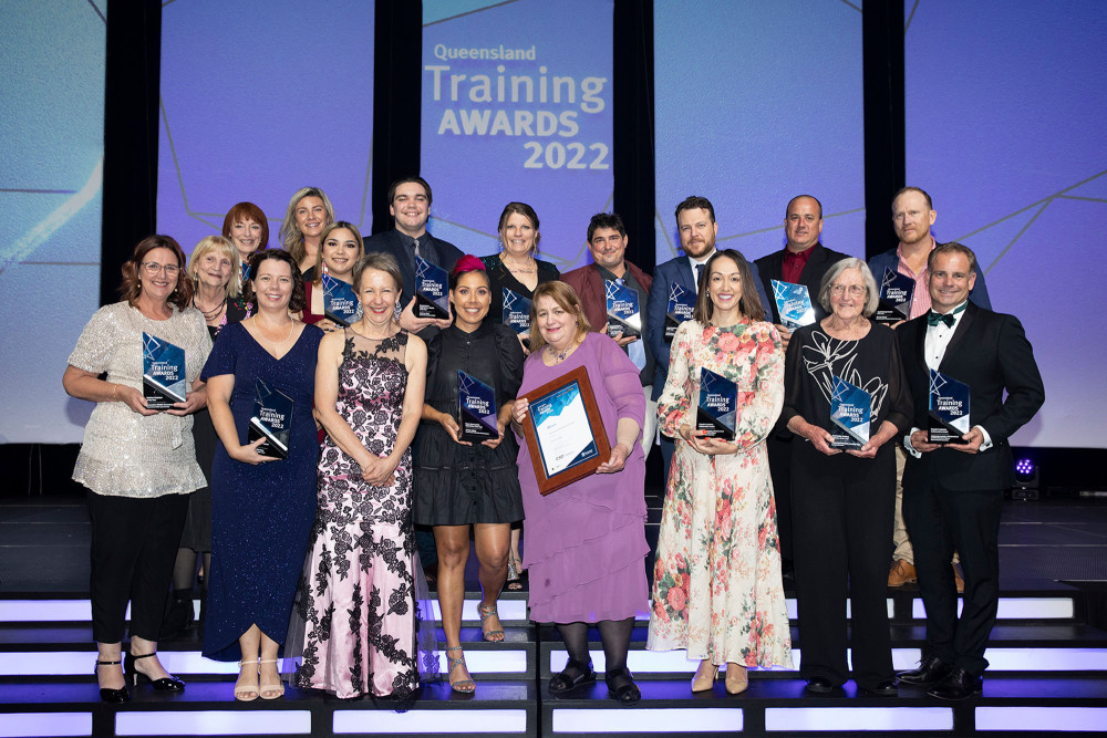 Jennah Halley (centre) with Di Farmer (left) Minister for Training and Skills Queensland with other regional award winners