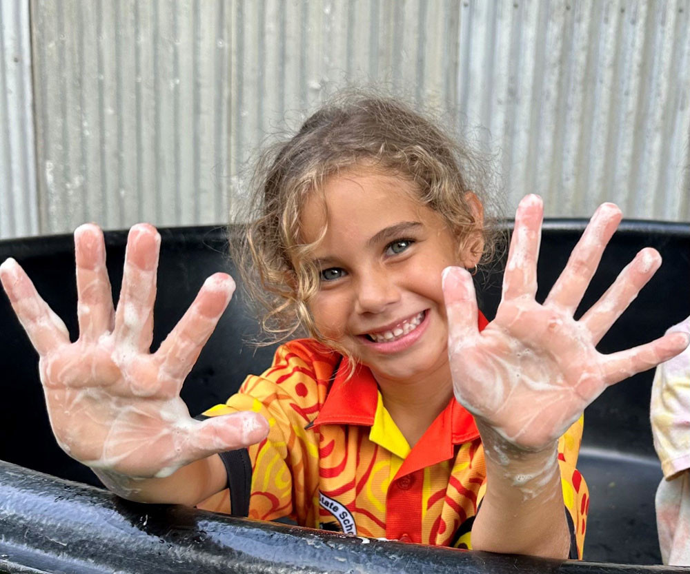 Avarie Hari, 6, is helping to spread the message that cleanliness can help stamp out preventable Rheumatic Heart Disease (RHD) at Yarrabah.