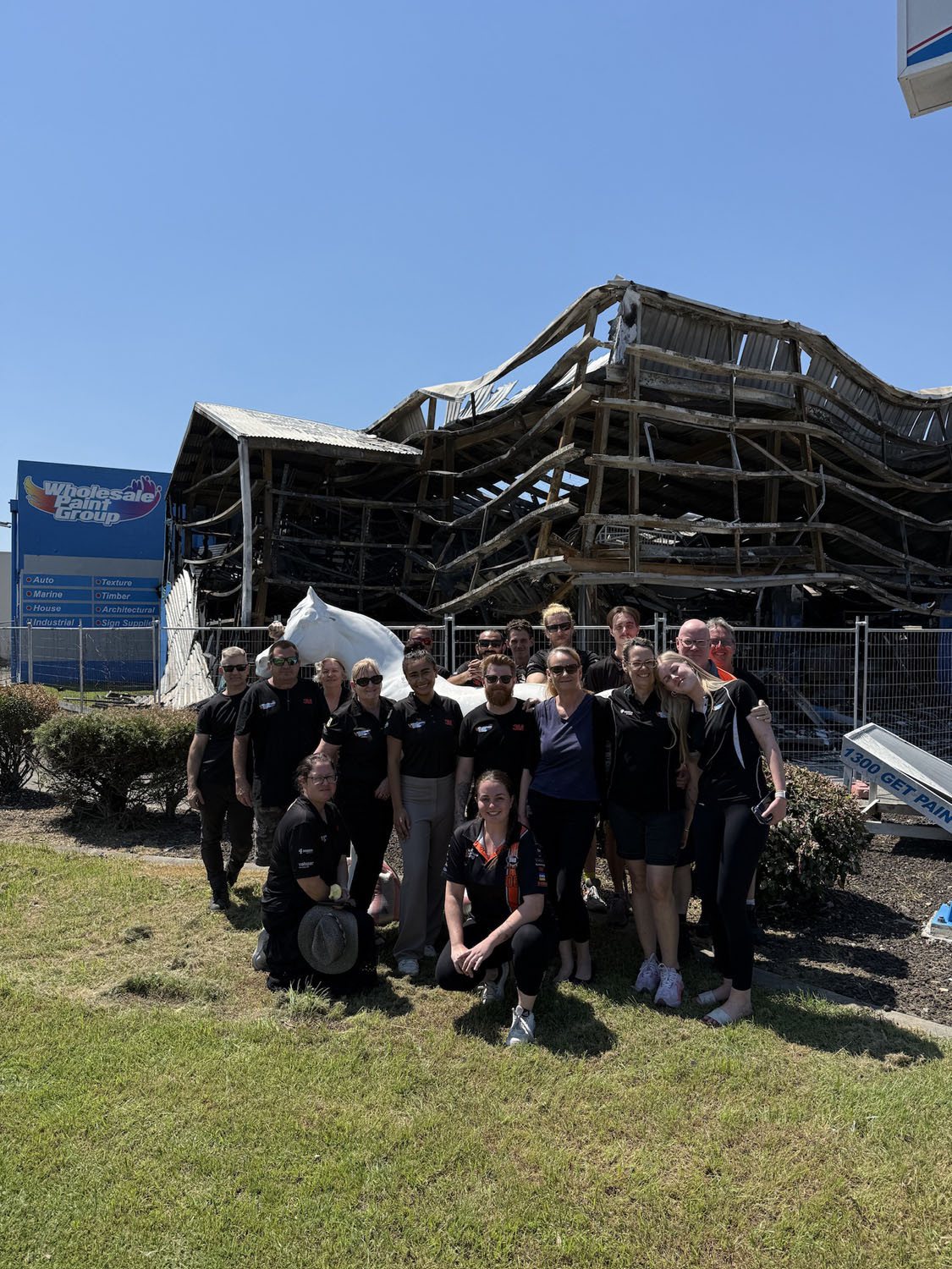 Wholesale Paint Group staff were quickly back at work despite the fire that destroyed their Portsmith head office and factory on Monday. Picture: Facebook