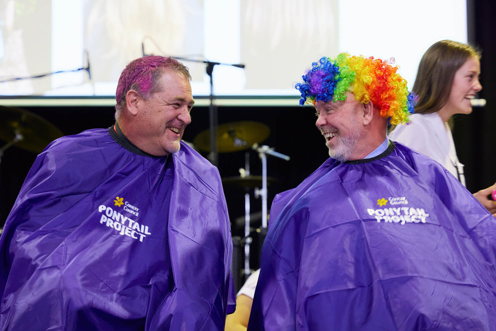 15 students and 3 teachers broke their own fundraising record by sacrificing their hair for a great cause