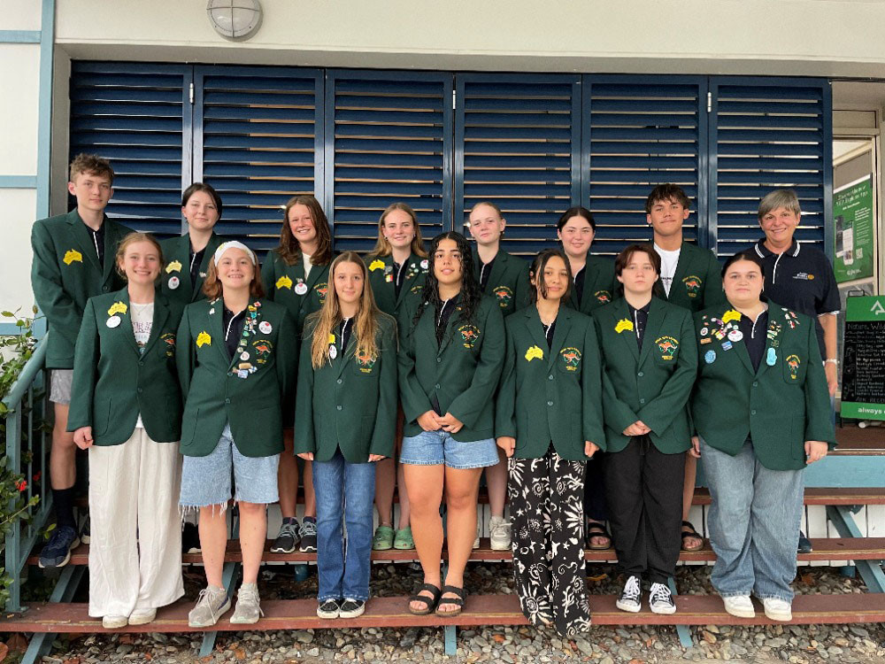 Soon-to-be outbound students (from left, front row] Ruby, Zoe, Abi, Kayla, Alyssa, Jorja-Rae, Marley, (back row) Isaac, Grace, Lucy, Ellie, Lianna, Emily, Luca, (surnames withheld) prepare for their transformative journeys overseas with Rotary youth exchange chairwoman Heather Sugget. Pictures: Rotary Club of Cairns West