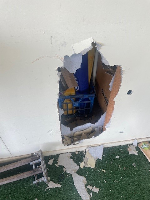 smashed-wall-at-mulgrave-cricket.jpg