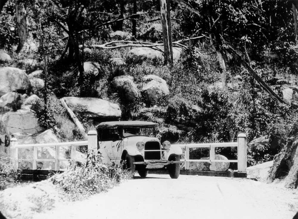 White Car Line standard Studebaker on the Cairns-Yungaburra Road, 1925.